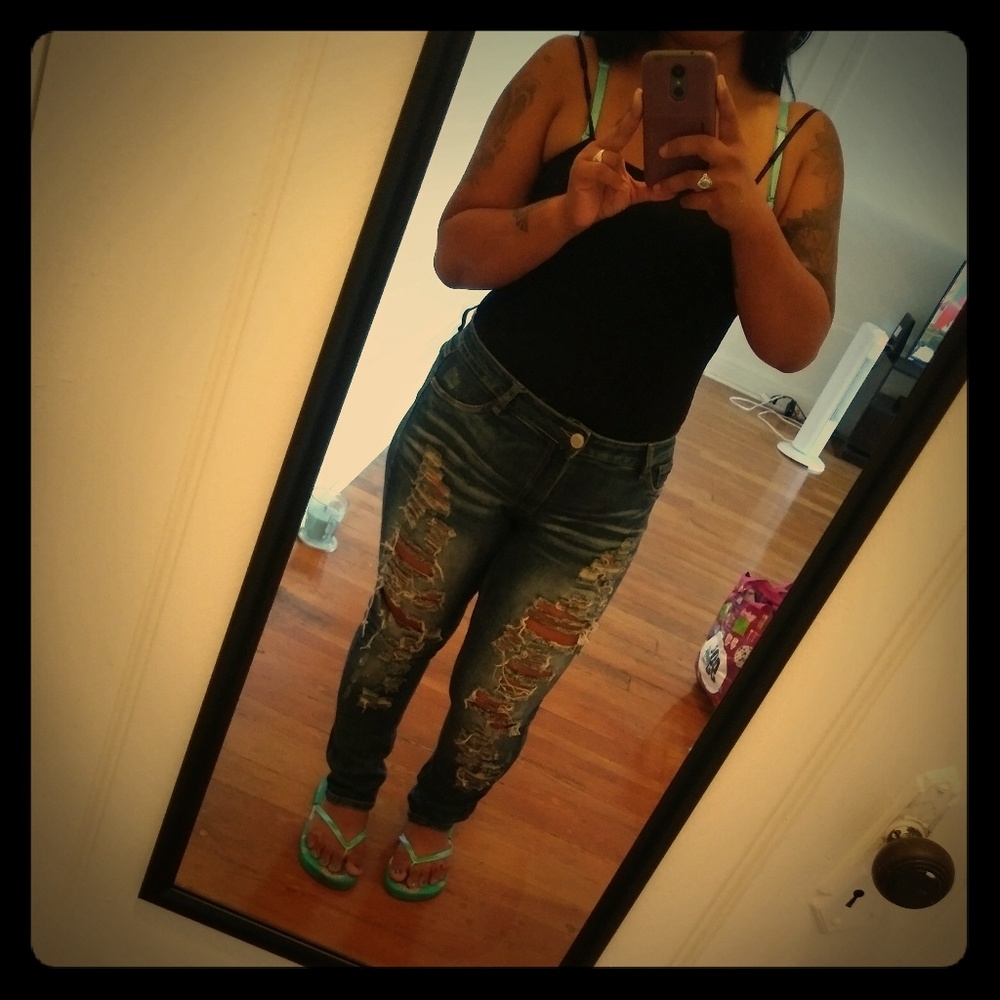 Blue shredded jeans